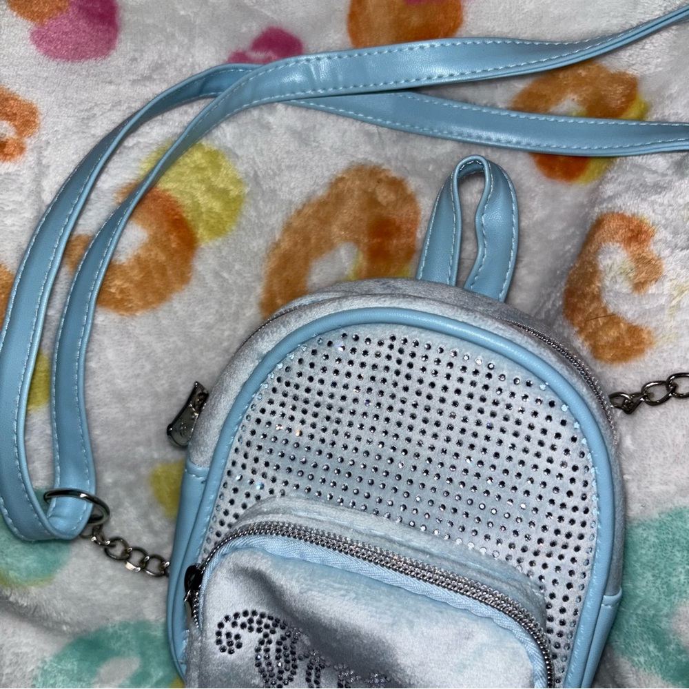 Juicy Couture mini backpack/adjustable shoulder bag